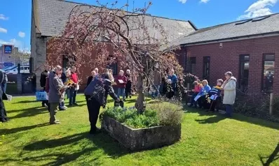 Good Friday gathering after walk of witness